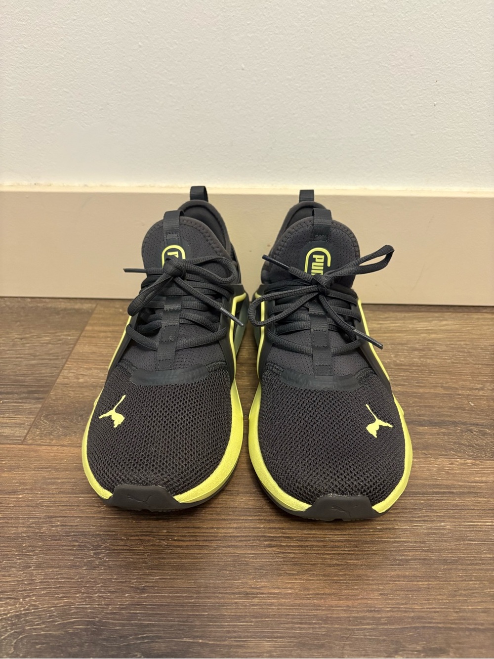 Puma Black and Neon Yellow Softride Athletic Sneakers